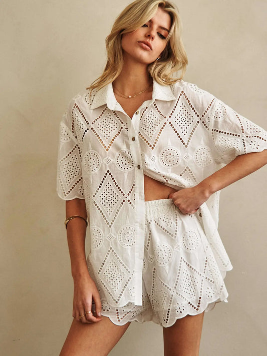 white eyelet short-sleeve blouse